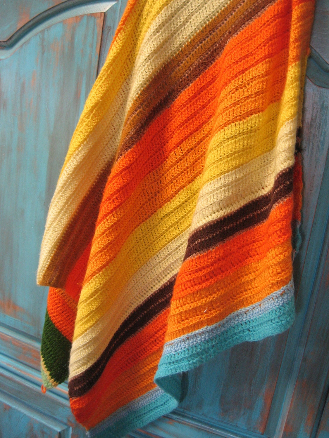 Lovely lap/ couch/ daybed crochet blanket in bold color blocks of tangerine, yellows, chocolate, turquoise