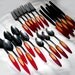 Two Toned Flame Bakelite Vintage Flatware. 22 Pieces. Circa USA 1930s.