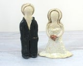 Bride and groom wedding cake topper