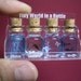 Four kinds of sea animals are in a tiny bottle in a small cute case