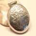 Vintage locket. Birds and poem. Sterling silver. Oval