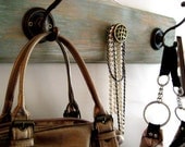 Coat and accessory rack in a rustic cottage chic style with three hooks, painted, aged, distressed