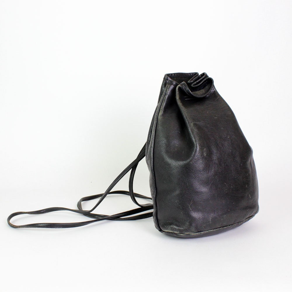 black leather backpack / cinch sling bag by OmniaVTG on Etsy