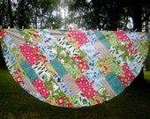 Handmade Christmas tablecloth, featuring unique prints, a bit of a retro look, 75 inches round.