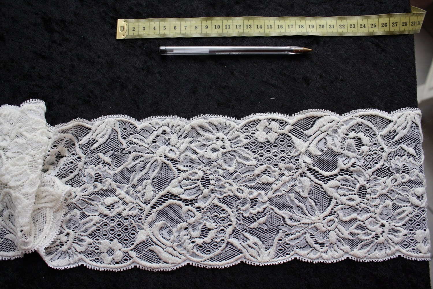 5.6 inches wide per 1yard long ivory stretch french lace trim
