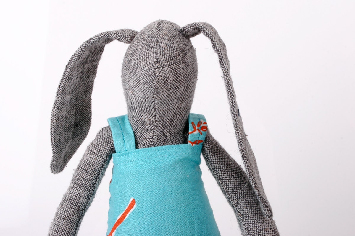 knitted Pure silk rabbit doll - Black and white rabbit wearing a turquoise blue dress with red coral flowers - handmade fabric doll