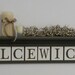 Personalized Family Name Signs 36" Brown Shelf with 10 Wooden Letter Tiles Custom for ILCEWICZ with Maple Leaves