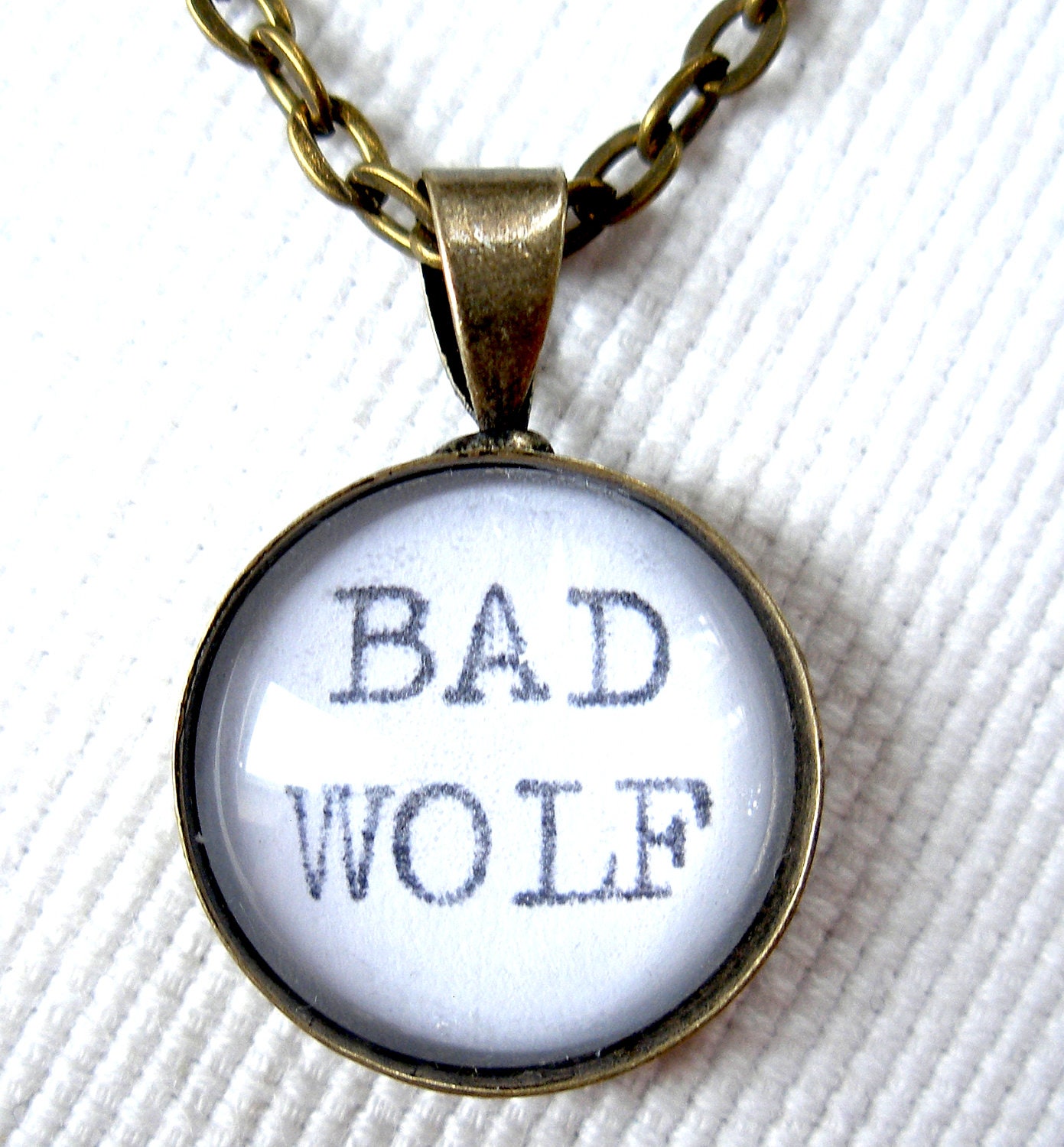 Doctor Who BAD WOLF Small Pendant Necklace with Real Vintage Typewriter Text- black white bronze