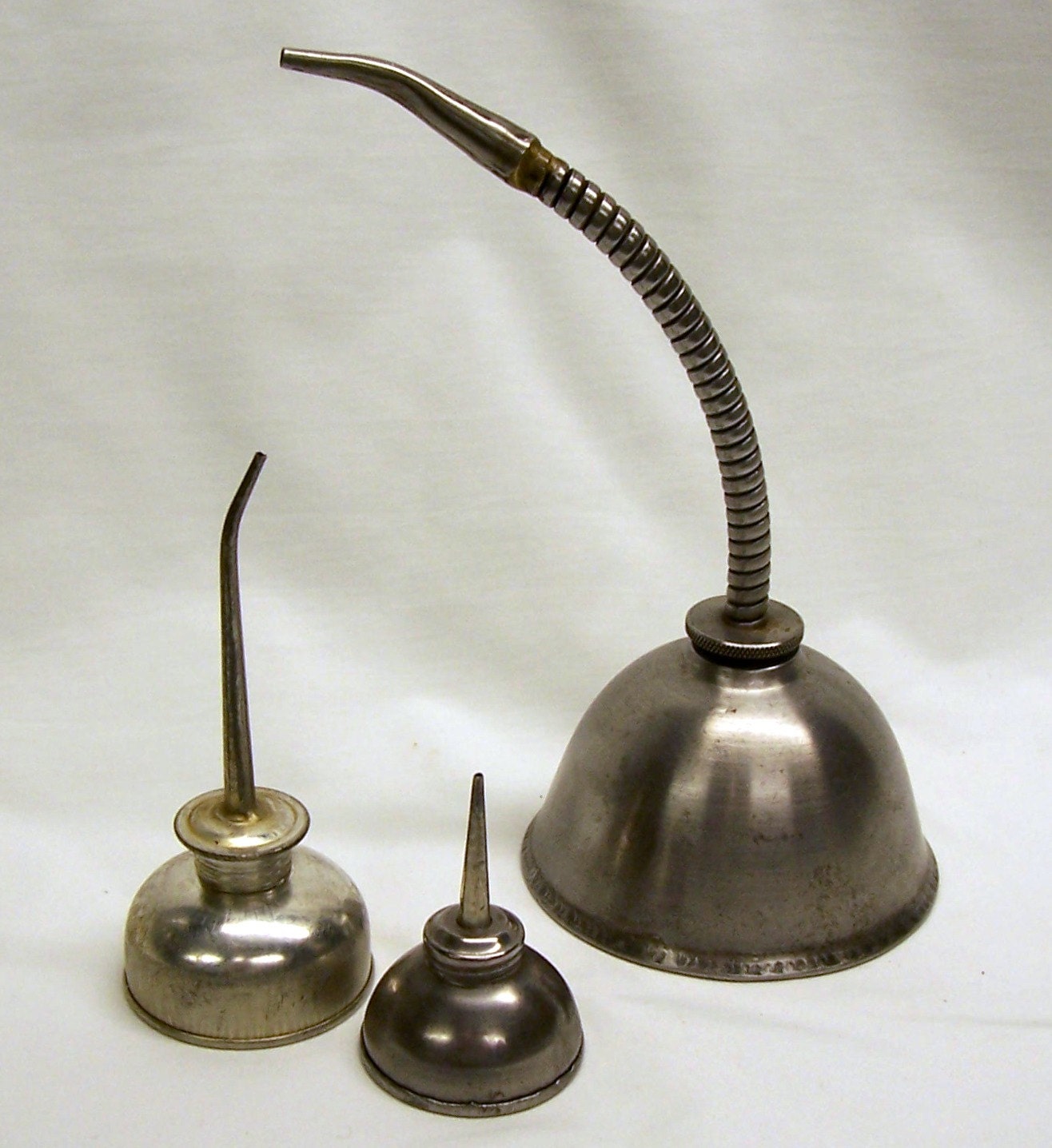 Instant Collection of Three Vintage Oil Thumb Pumpers