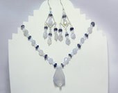 Light blue chalcedony, iolite and Swarovski crystal pendant necklace set.