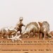 vintage brass set of four dinosaur figurines