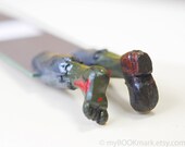 Zombie Legs in the book. Unusual art bookmark. Weird rustic gift. Bloody mossy green legs. for him, for kids