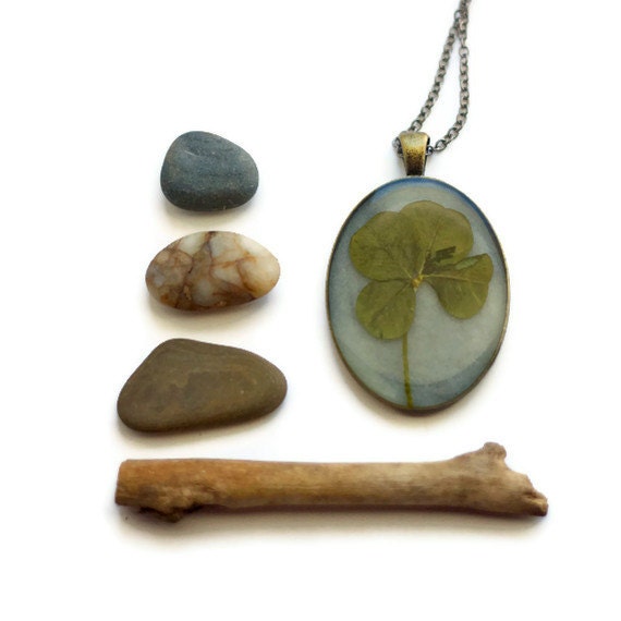 resin jewelry four leaf clover real pressed leaf botanical pendant. sage green 4 leaf clover set in resin get lucky luck saint patricks day