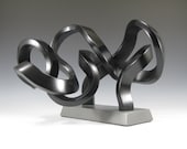 Modern Abstract Sculpture     titled    Evenflow