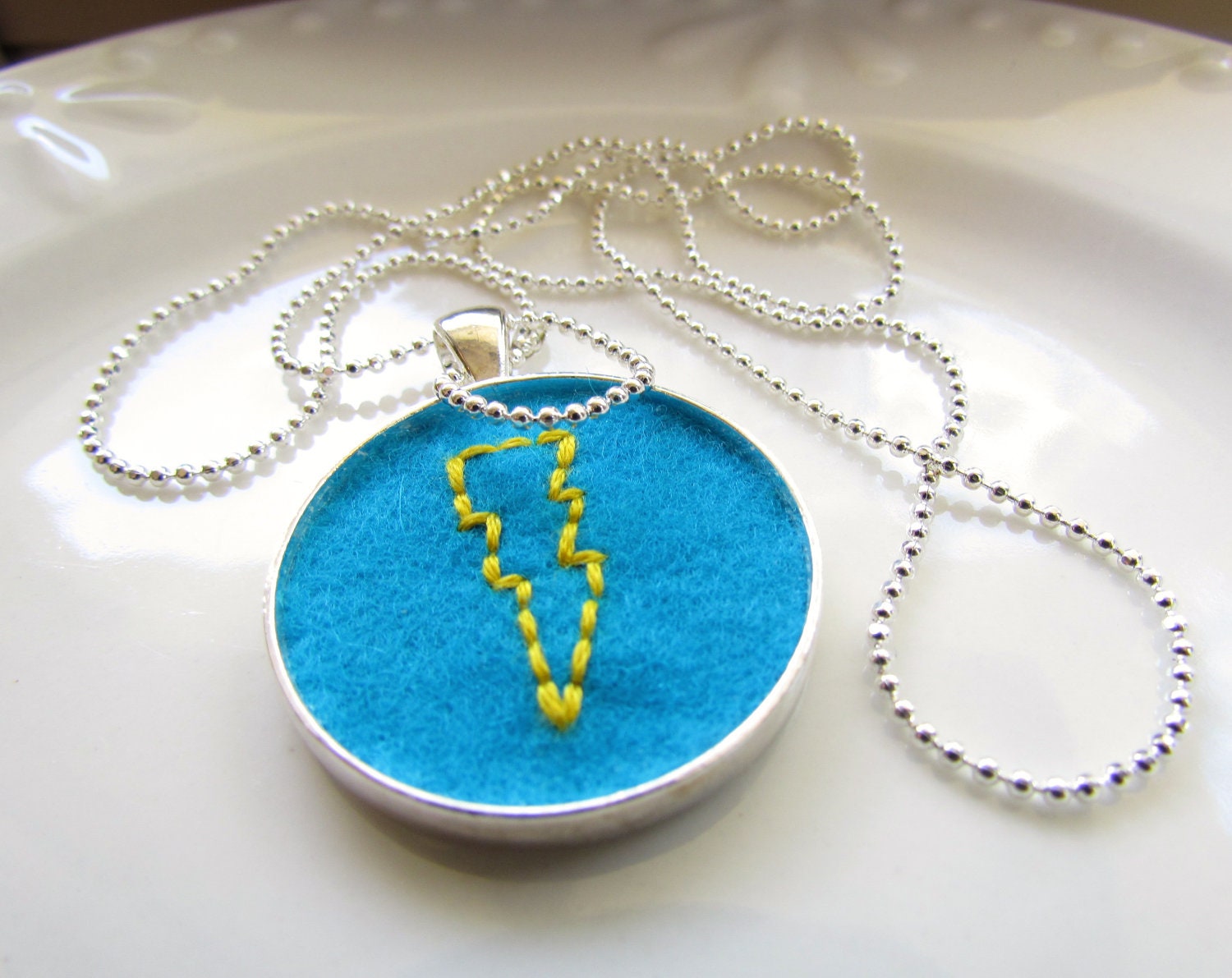 What's Your Superpower - Hand stitched pendant, yellow on blue