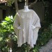 Hand Knit Ivory Wool Poncho With Fringe
