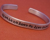 Rent Inspired - Give In To Love Or Live In Fear - A Hand Stamped Aluminum Bracelet