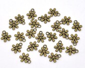 5 Bronze Flower Charms: small 11mm floral metal charm pendants