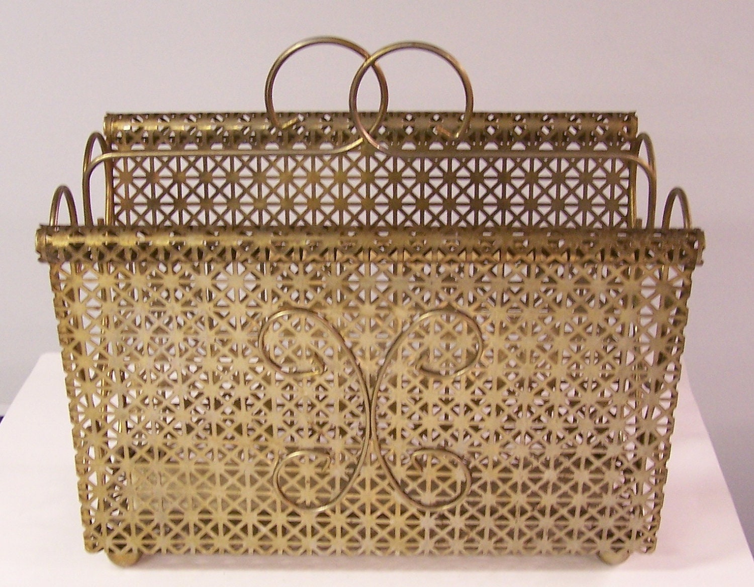 Vintage mid-century metal magazine rack
