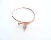 Copper bangle bracelet with pewter drop bead