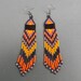Purple and orange beaded earrings