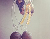 wire wrapped with carnelian with brown cord vintage lucite bead