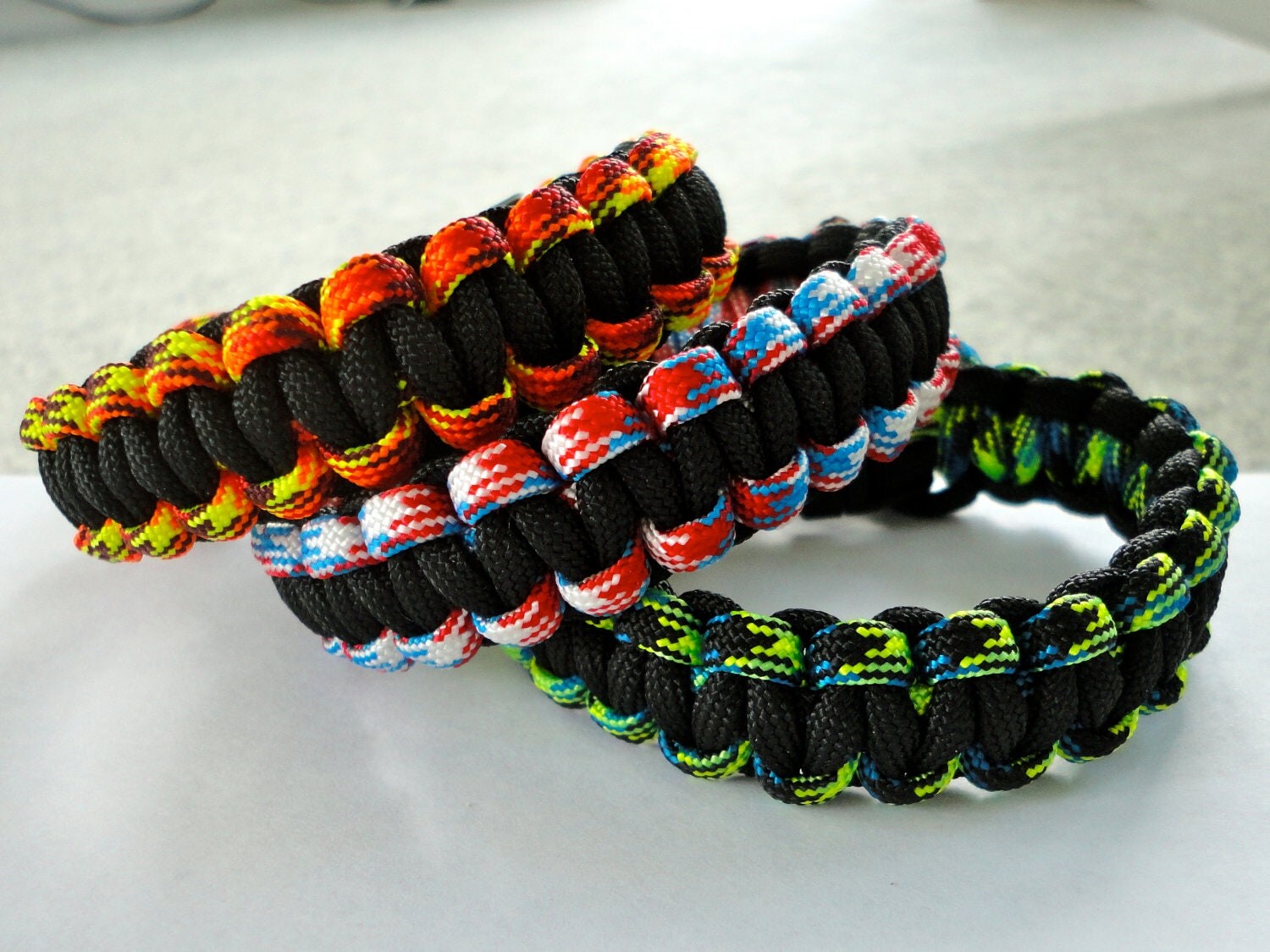 New Paracord Bracelet Pinwheel Seesaw camo red white blue orange blue green black Made in u.s.a.