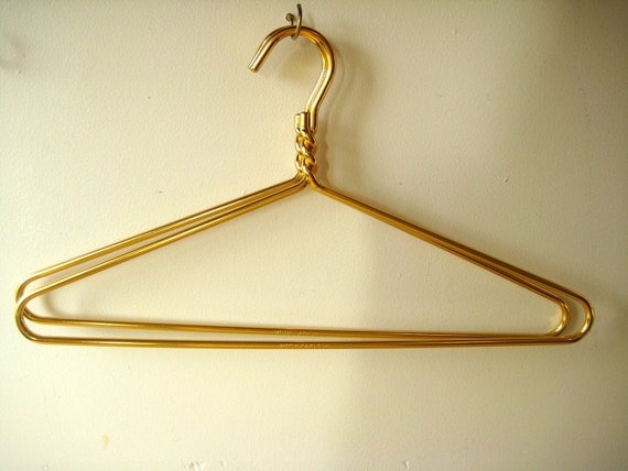 pair of vintage gold aluminum hangers / Dodco by EightLotsRoad