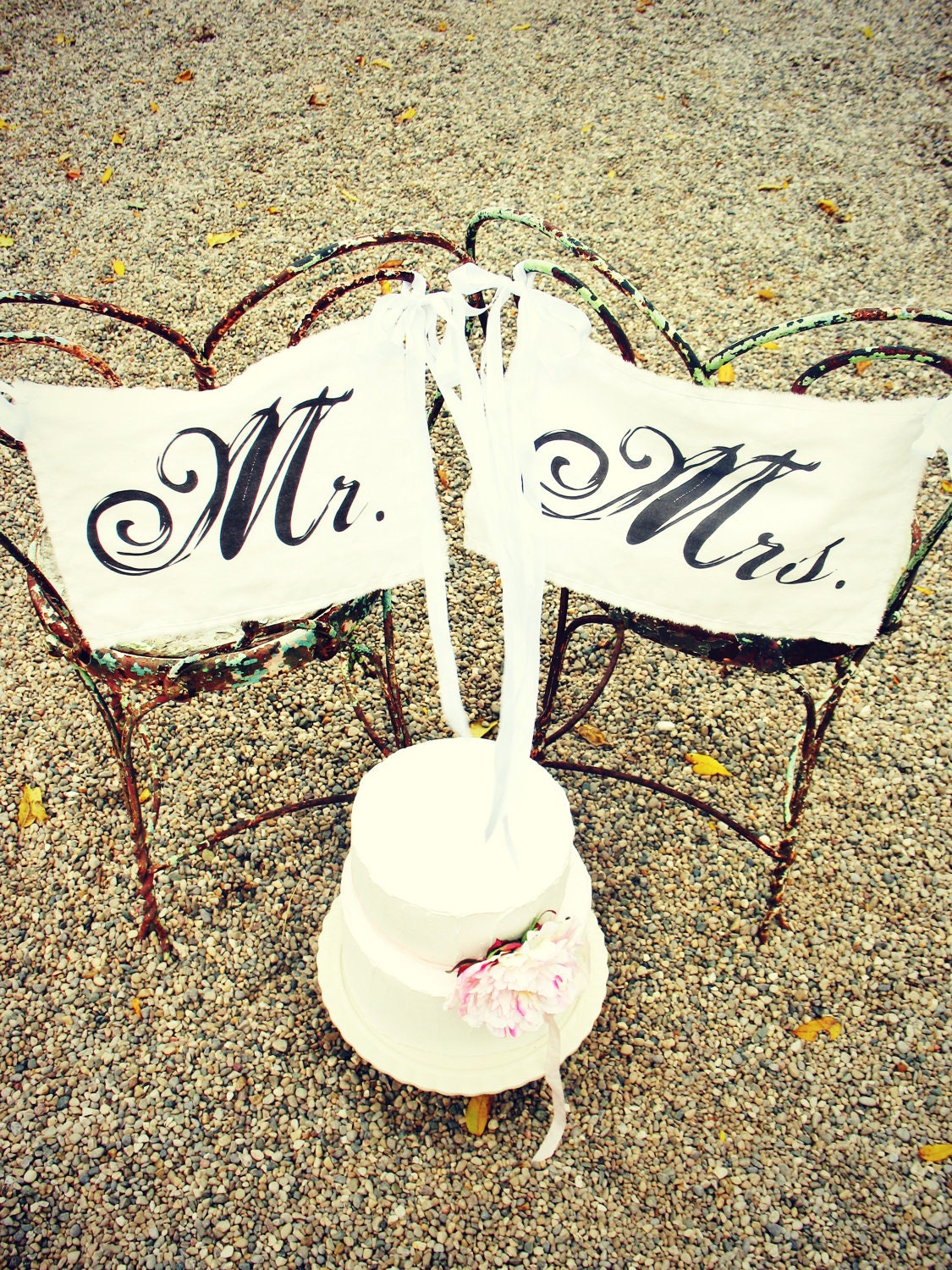 Mr. and Mrs. chair signs . fabric and ribbons . for a cottage chic wedding