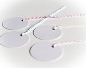 10 white round tags