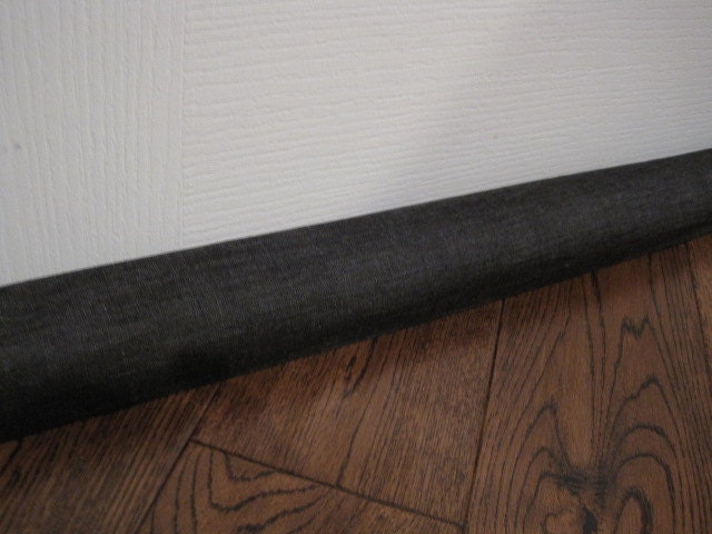 D E N I M door draft stopper, draft snake, draft dodger. Dark denim fabric.