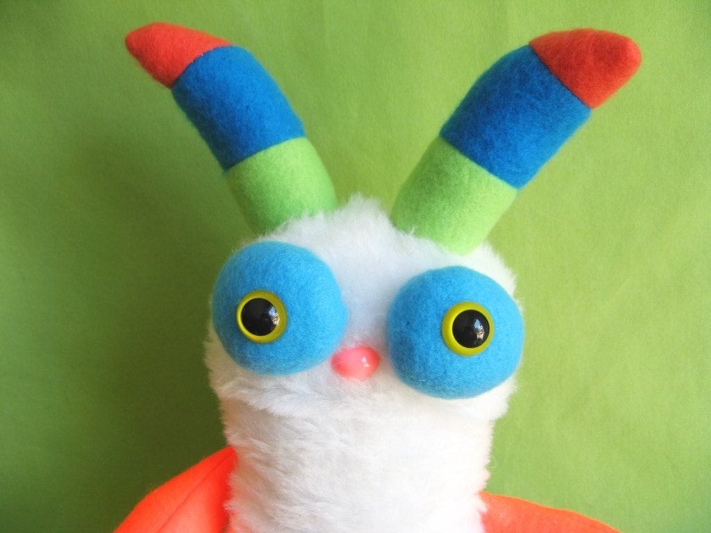 Monster toy stuffed animal plush with striped horns