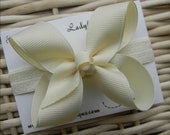 Infant Basic Portrait Hair Bow on a Soft Interchangeable Elastic Headband - Cream