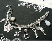 Silver and Pearl charm bracelet