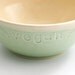 Vegan cereal bowl in green with stitching.