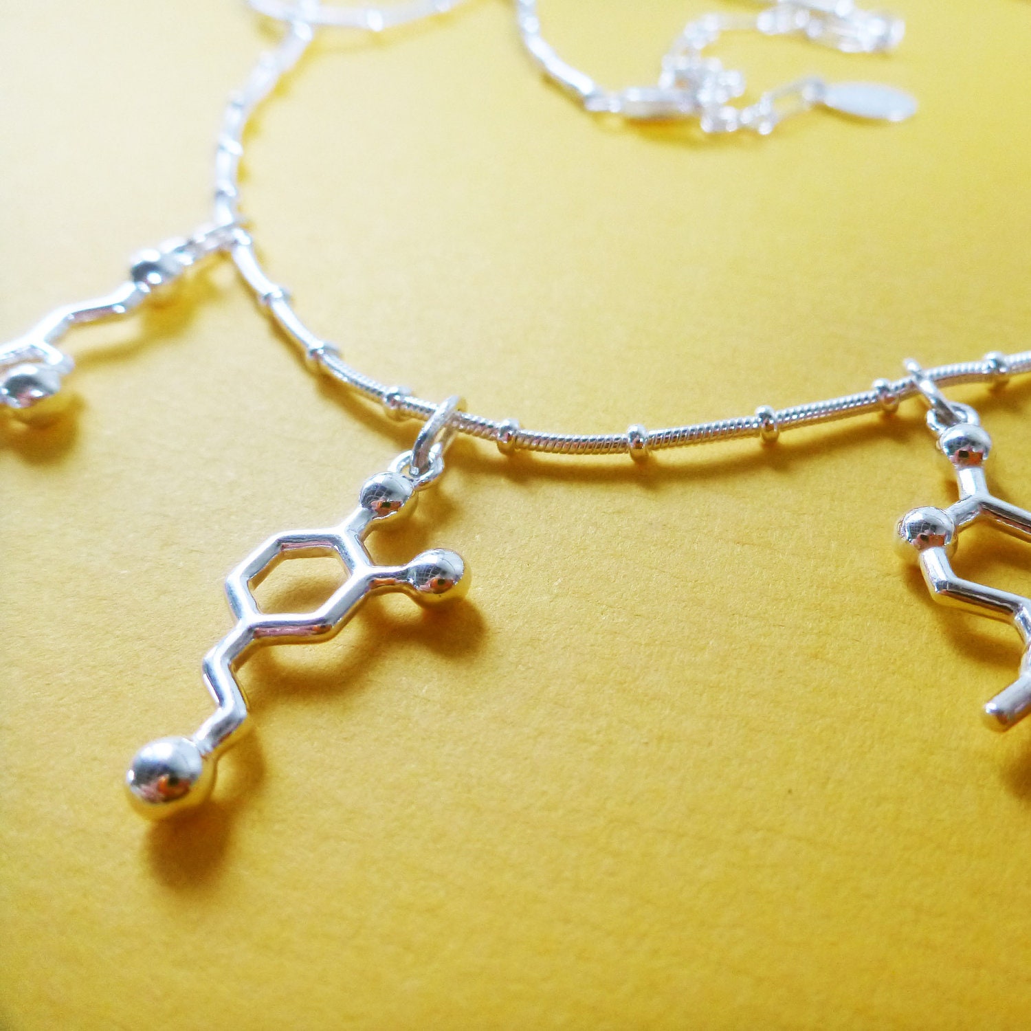 creativity necklace - three molecules that rock