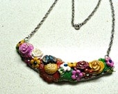 Jewelry Flowering necklace handmade of Polymer Clay multi colored flowers on silver paleted frame by Artefyk