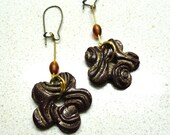 Jewelry Dangle flower shape Earrings handmade of polymer clay in sparkle brown  by Artefyk