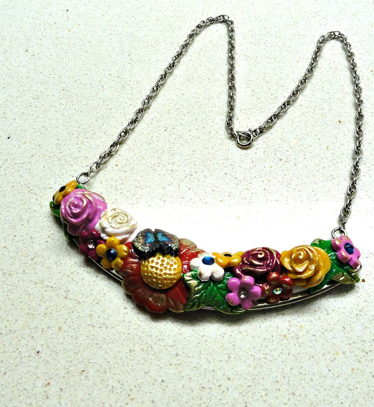 Jewelry Flowering necklace handmade of Polymer Clay multi colored flowers on silver paleted frame by Artefyk