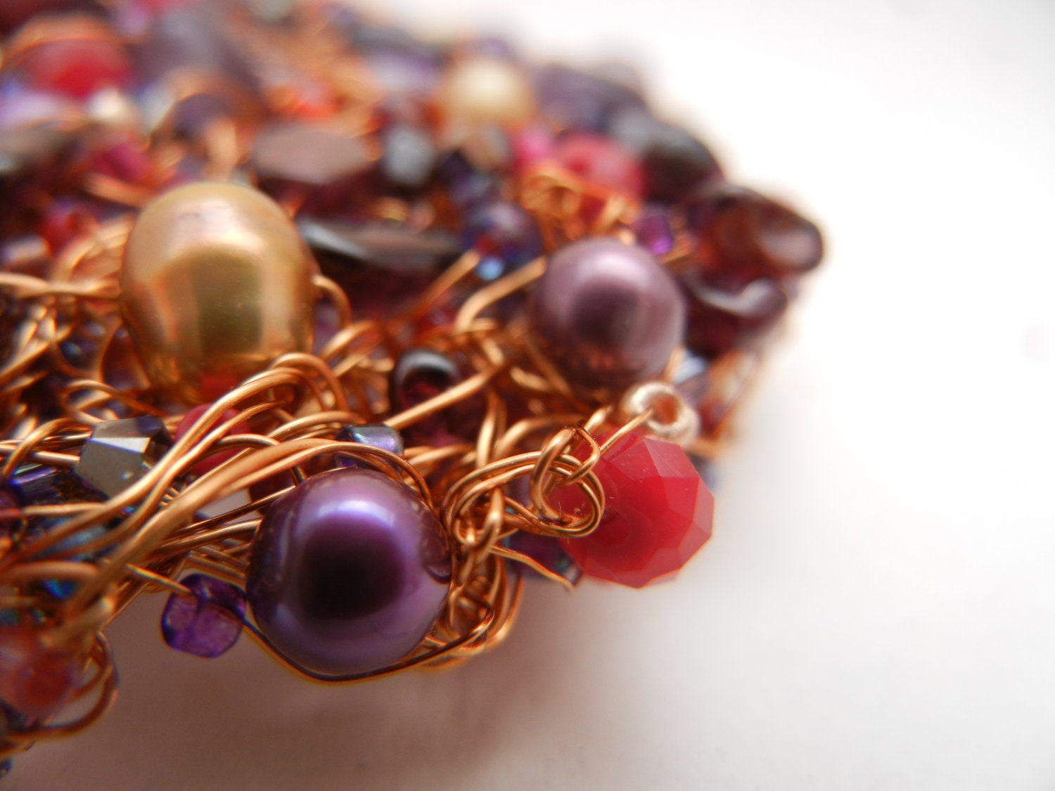 Stunning OOAK brooch in Gold, Garnet and Purple.  Knitted, Crocheted, Woven Wire : pearls, semiprecious stones