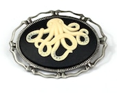 Steampunk Octopus Cthulhu Tentacle Cream and Black Cameo Brooch Pin with Antiqued Silver Frame by Velvet Mechanism