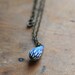 Tide carved necklace