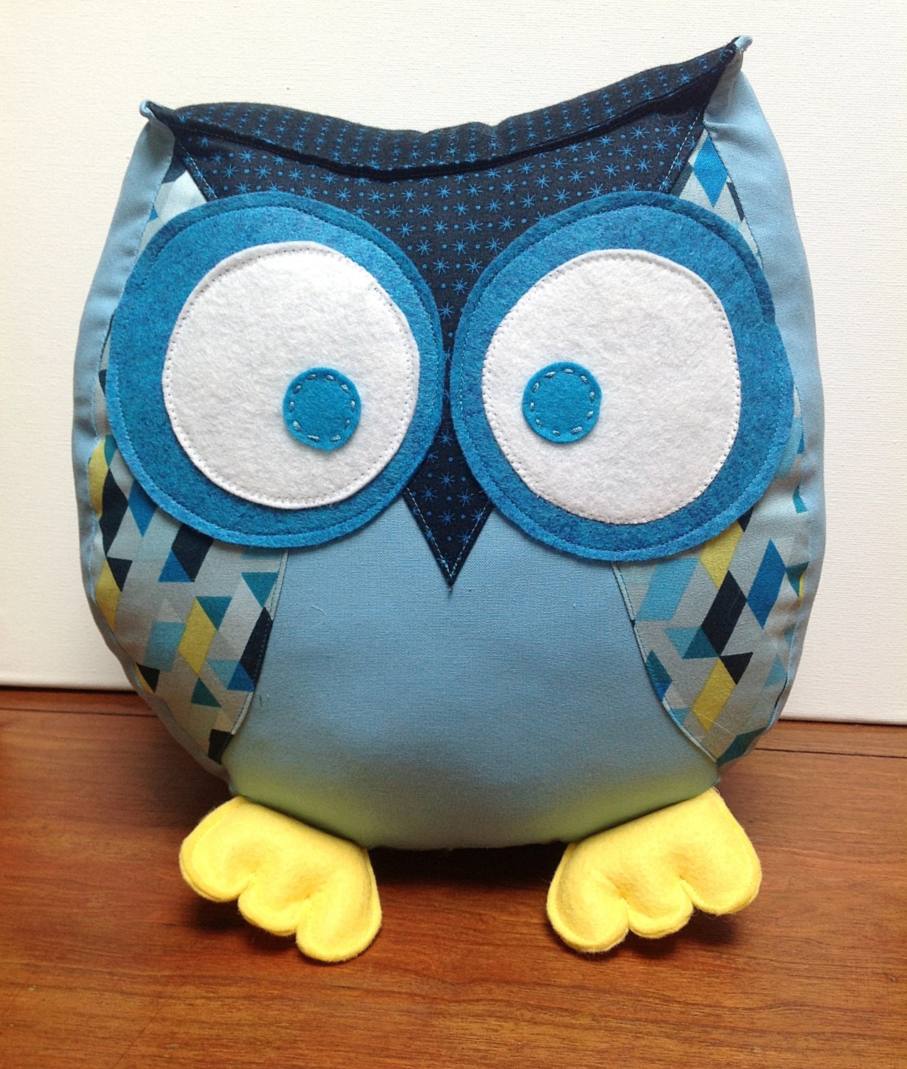 Chubby owl pillow in shades blue and yellow