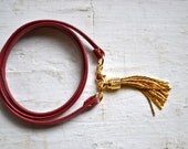 oxblood smooth genuine leather triple wrap bracelet with gold tassel