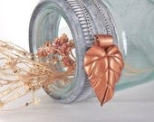 leaf pendant with hidden locket