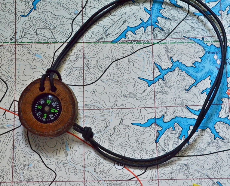 Compass and natural oak tree branch.  Perfect for hikers, hunters, campers, boy scout, girl scouts etc.  Handcrafted......244