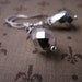 Silver Metallic drop earrings with vintage Swarovski comet argent crystals