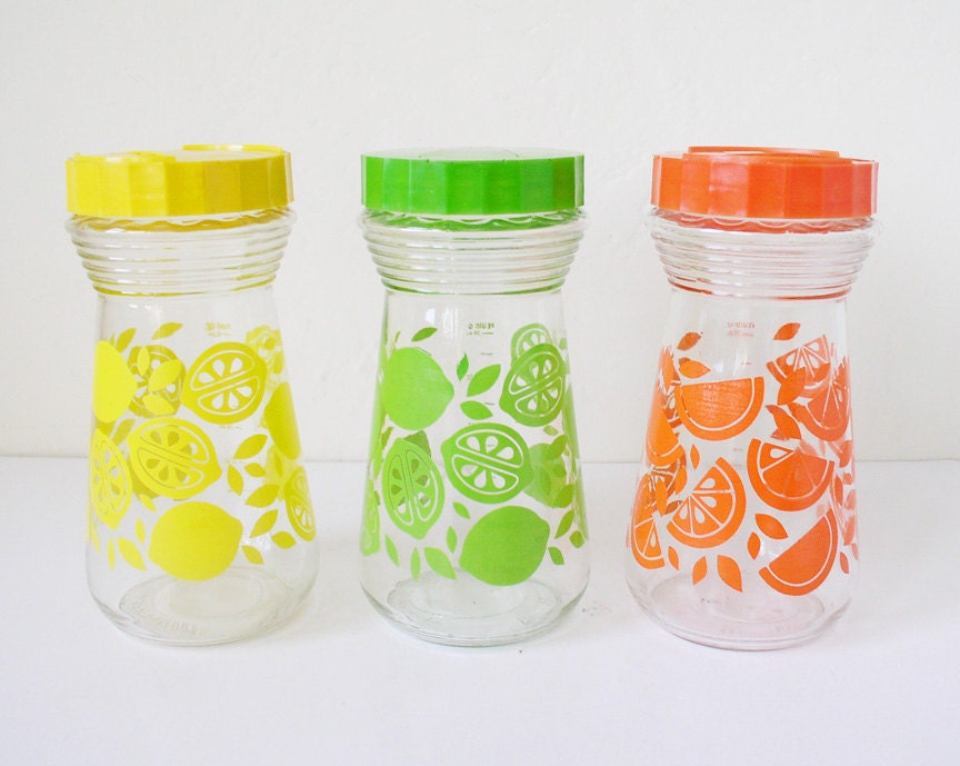 Lemon, lime, orange juice carafes, pitchers