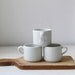 Vintage 1970s Dansk cups. 3 stacking coffee mugs. Cloud white ceramic. Danish modern mid century minimal / the AUTUMN LATTE cups