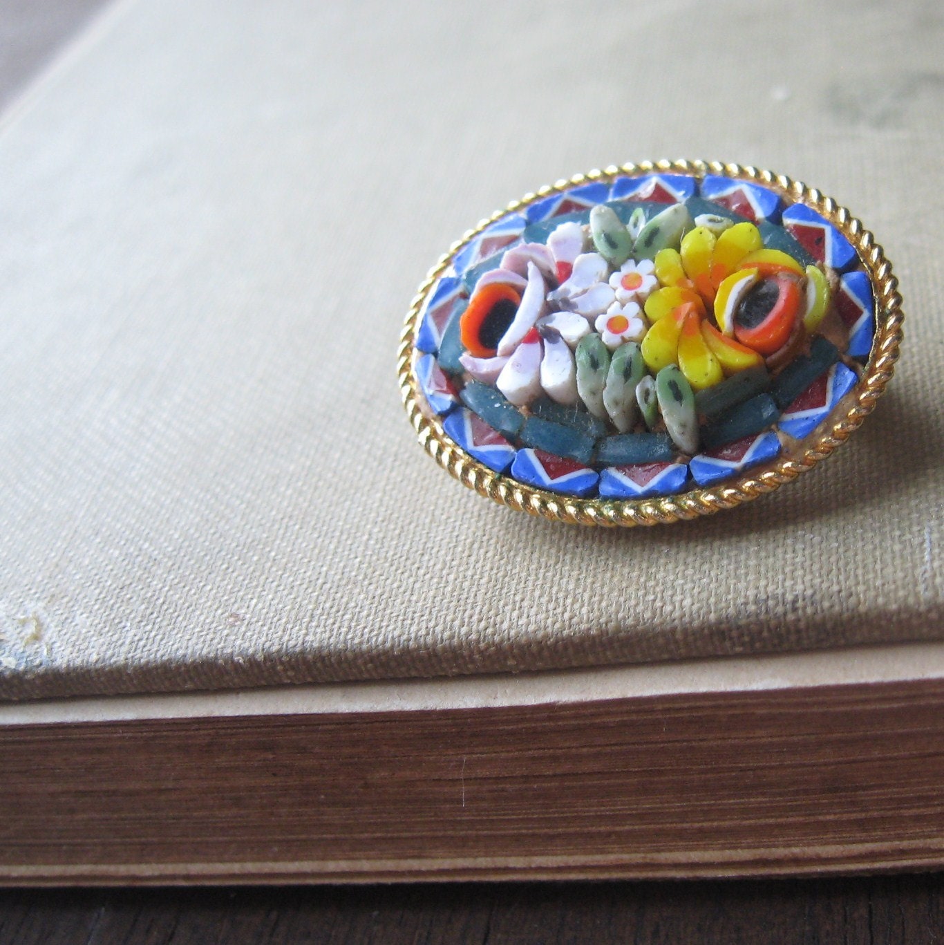 blue yellow and red micromosaic floral pin brooch from italy